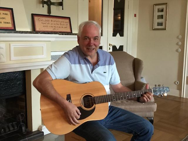 Daugherty plays acoustic guitar. Although the COVID-19 pandemic has led to the cancellation and postponement of many live music events, Daugherty said he finds joy in playing his guitar and making music. Photo courtesy of Daniel Daugherty