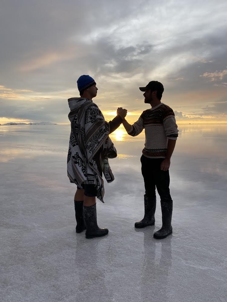 Jacob Erbes and Ekenstam visit the largest salt flats in the world in Uyuni, Bolivia, during their travel break from the BA program in February. Erbes said he loves to post pictures from his time abroad on the club's Instagram, especially since the club cannot take any in-person photos. Photo courtesy of Jacob Erbes