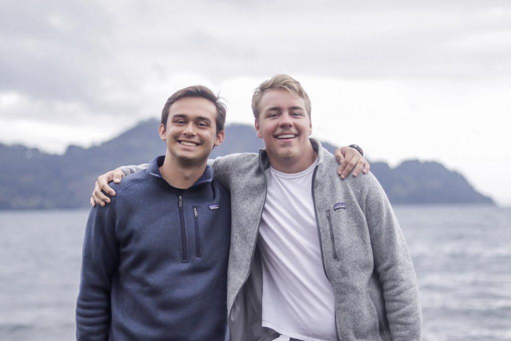Club founders Aaron Ekenstam (left) and Nicholas Olson (right) visit a lake near Pucon, Chile, in September 2019. Olson said living in Buenos Aires, Argentina, helped him become a confident Spanish speaker and inspired his idea for the club. Photo courtesy of Aaron Ekenstam