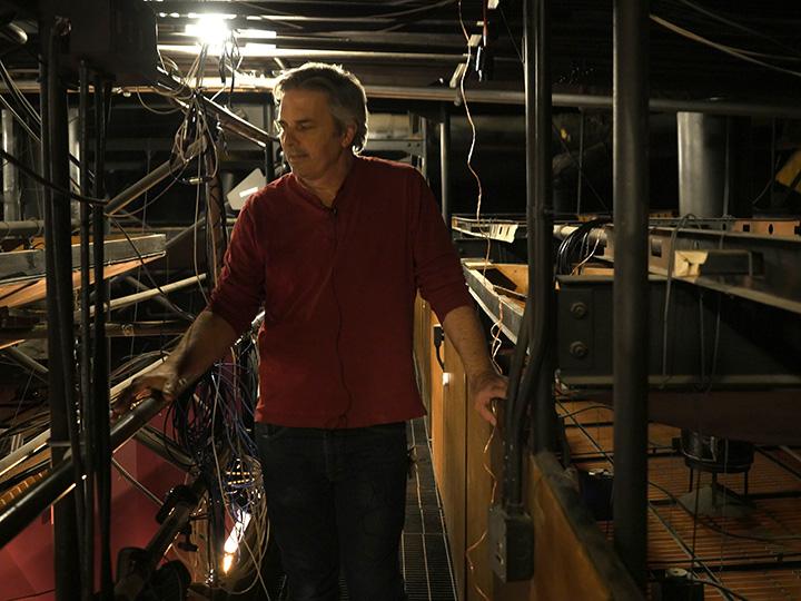 Assistant Technical Director Stewart O’Rourke stands on the catwalk above Smothers Theatre on March 2 from where he believes a mysterious clapping originated one night in the late 1980s. When workers checked, there was no one there. Photos by Kaelin Mendez