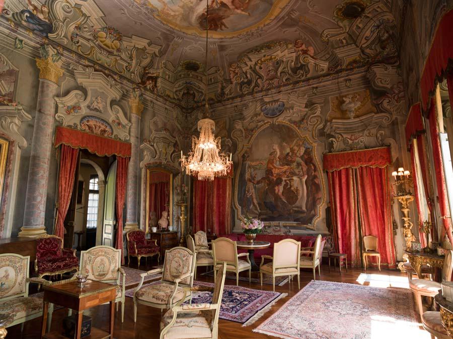 The living room in the Chateau d'Hauteville remains in the 18th-century style. Pepperdine finalized the purchase of the chateau in 2019. Photo courtesy of SwissCastles.ch