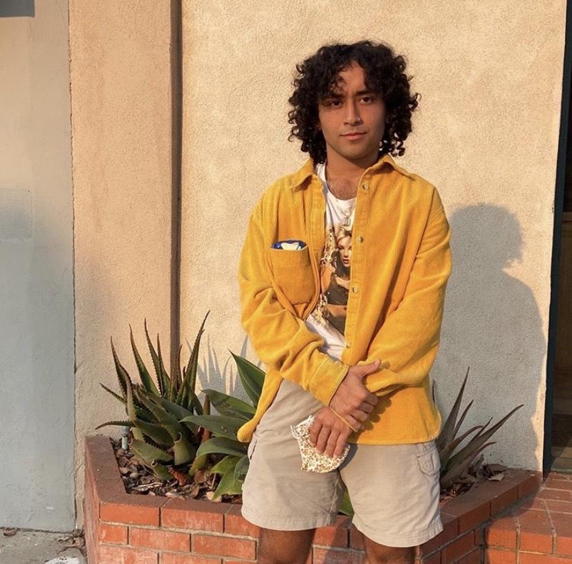 Political Science major Ivan Manriquez enjoys a sunny October day after eating frozen yogurt in Morro Bay, CA. He said he struggled getting involved this fall because he only has the patience for classes, as being on a computer for too long becomes difficult. Photo courtesy of Ivan Manriquez