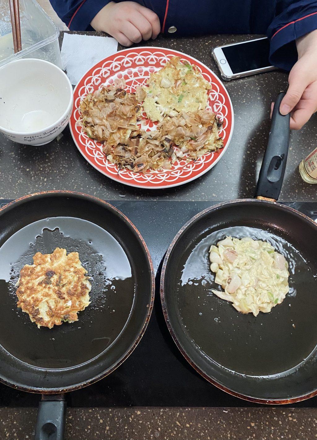 Grace Lee, a senior Chemistry major at Sangmyung University, and I cook Okonomiyaki on a kitchen stove Sept. 19. This was the second time I cooked with another housemate, and it was the beginning of a new friendship.