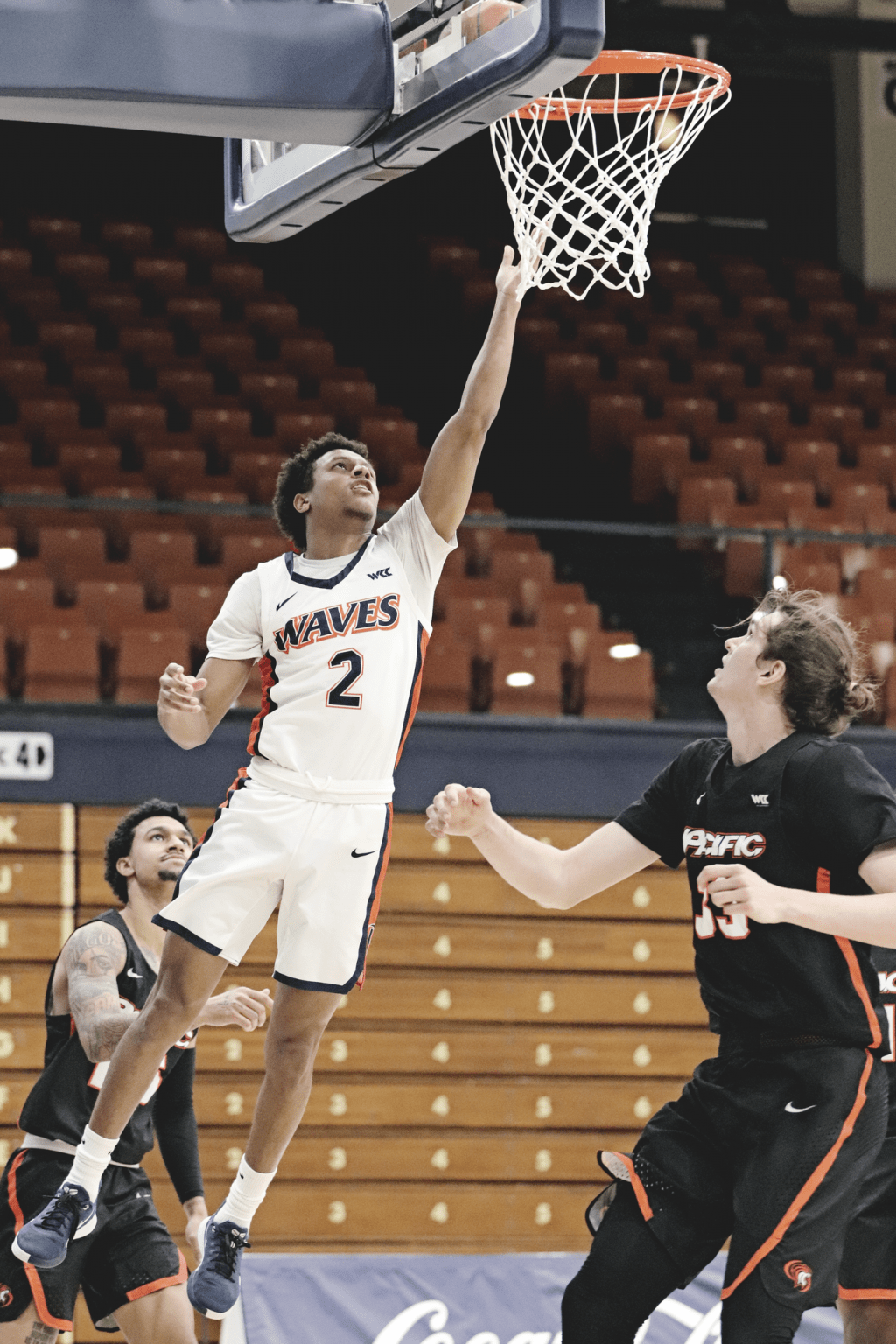 Junior guard Darryl Polk Jr. extends for a soft layup at the rim during the second half.