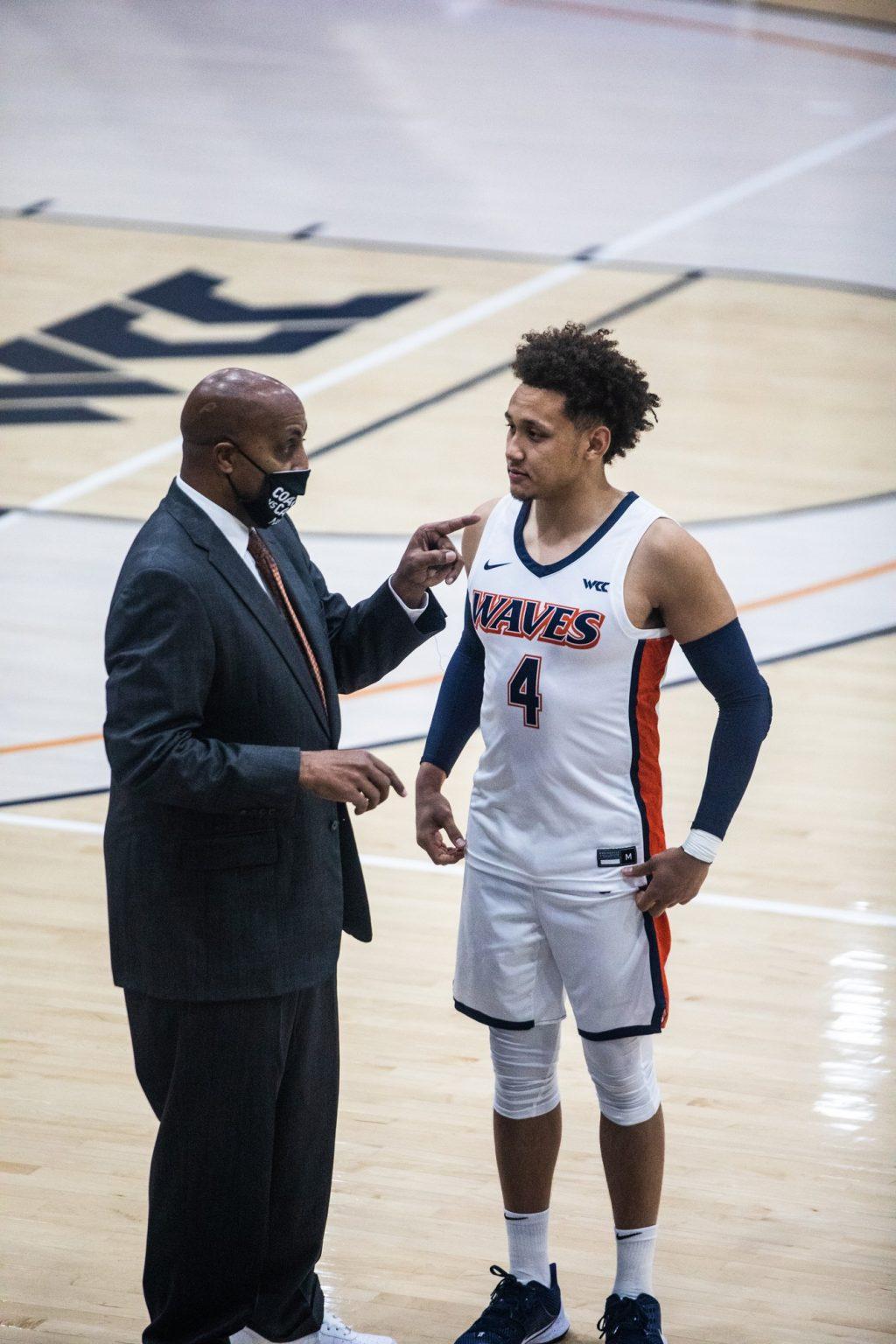 Head Coach Lorenzo Romar instructs Ross during BYU free throw attempts. Ross stuffed the stat sheet with 19 points, 7 rebounds, 6 assists and 2 steals.