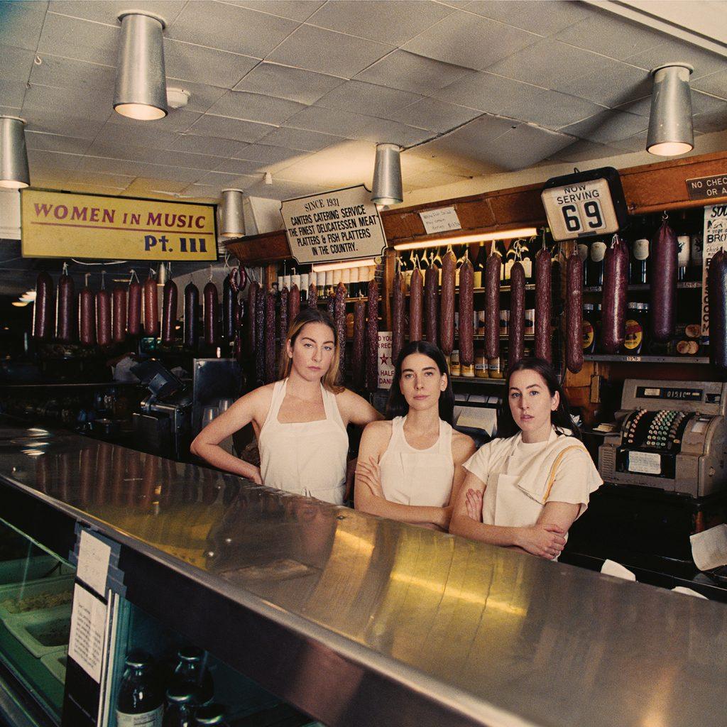 Sisters Este, Danielle and Alana Haim stand in Canter&squot;s Deli in Los Angeles. "Women in Music: Pt. III" was the group&squot;s third studio album, and they were nominated for Best New Artist in 2015 at the Grammys. Photo courtesy of haimtheband.com