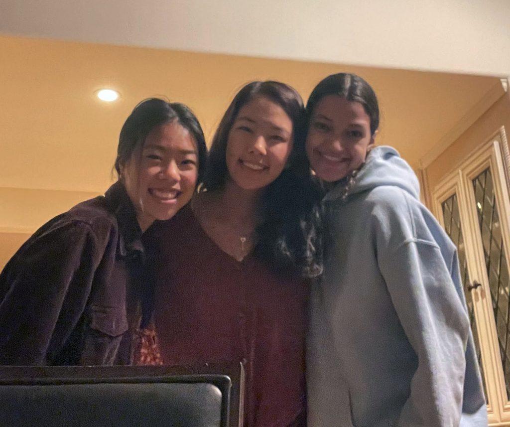 First-year students Annie Leow, Annette Im and Nayeli Castillo smile in their Malibu apartment Feb. 13. Many students moved to the Pepperdine area to find community after the University announced plans to begin the spring 2021 semester virtually. Photo courtesy of Annette Im