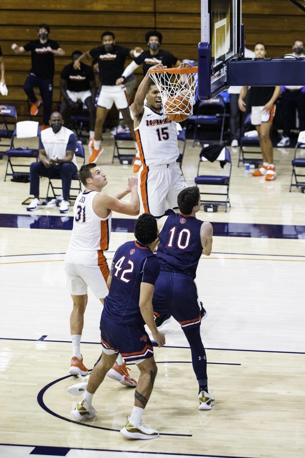 Edwards goes up for a two-handed jam in the second half. Of Pepperdine's 60 total points, 22 of them came from inside the paint.