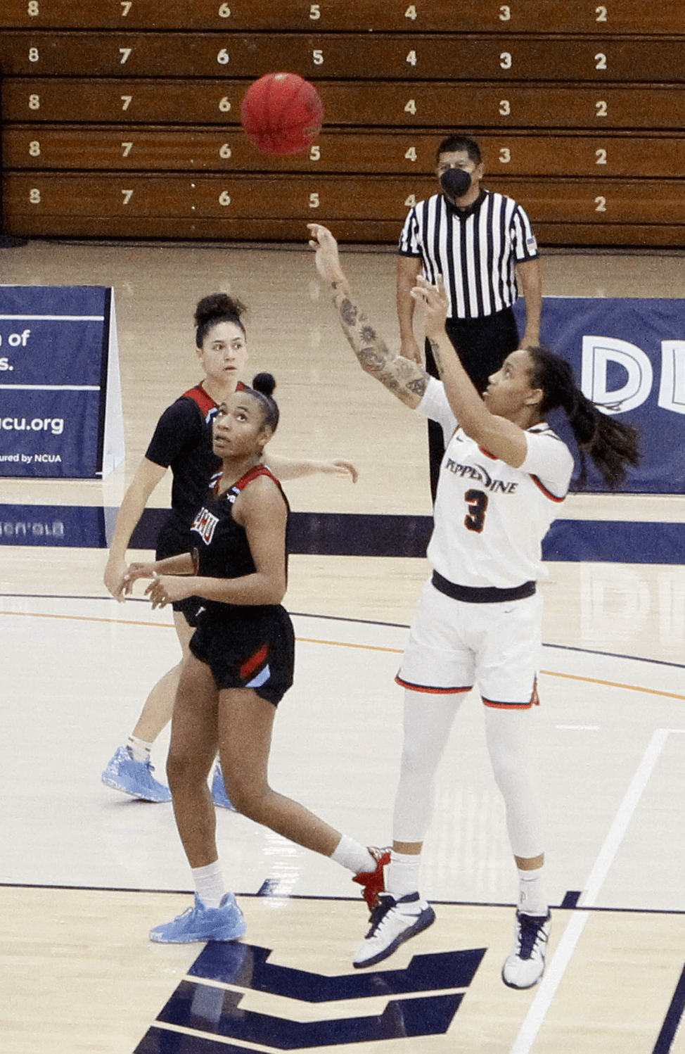 Redshirt sophomore guard Jayda Ruffus-Milner pulls up from midrange during Saturday's game against LMU. The Waves shot 37% from the field and crucially out-rebounded the Lions 45-30.