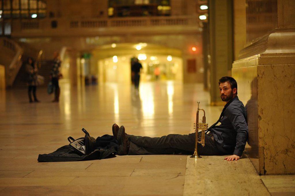 Nick plays the trumpet in Grand Central Terminal at 1:30 a.m. where he notices Brooke. This moment marked the start of their adventure in the city.