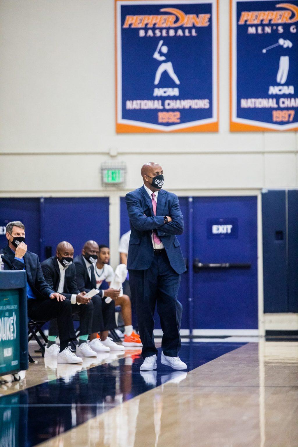 Pepperdine Head Coach Lorenzo Romar patrols the bench during his team&squot;s loss to the Gonzaga Bulldogs. Romar said after the game that the Zags "really could win a national championship."