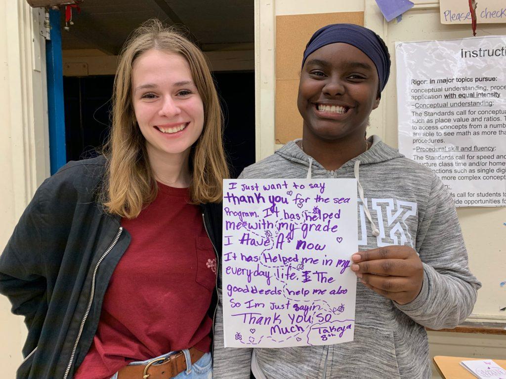 SEA tutor Zoe Clevely (left) stands with eighth grade student Takeya (right), who she tutored for one semester in Westchester, CA. Ellen Shane established many SEA affiliates outside of Malibu, including this duo.