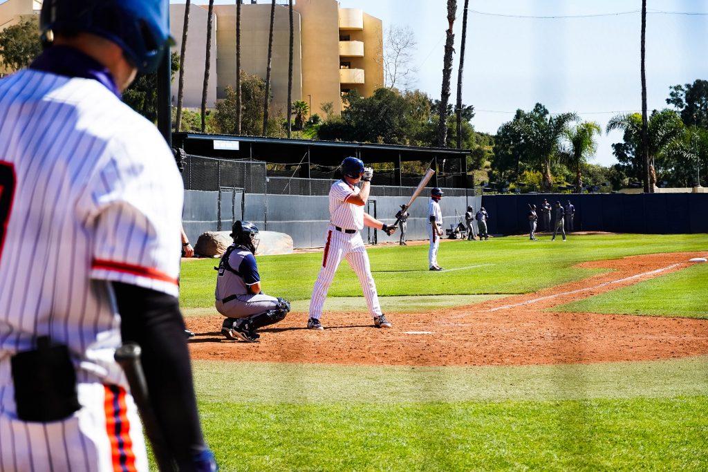 Senior center fielder Billy Cook stands ready in the batters box. Cook, who hit .344 last season with four home runs, was held without a hit in the opening series.