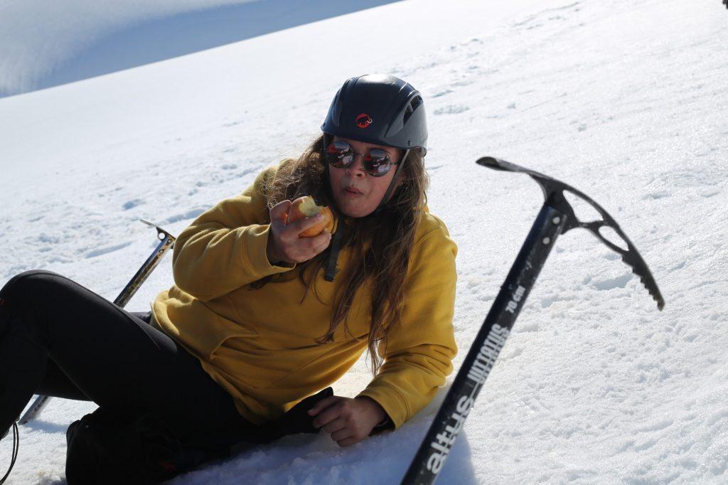 Luber is hiking Volcán Villarrica in Pucón, Chile during the first Educational Field Trip in Buenos Aires, October 30th, 2018. The hike was 6 hours up with crampons and ice picks and 2 hours down while sledding. The photo was taken by Annie Little.