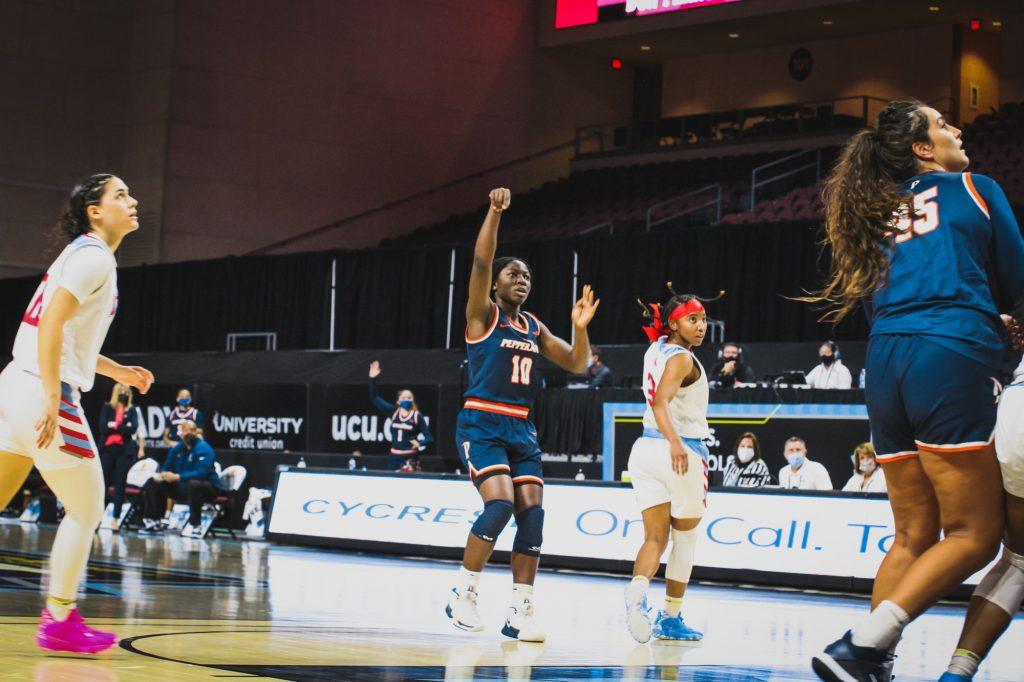 Freshman forward Jane Nwaba scores in the first round of the WCC Tournament against Loyola Marymount University. Nwaba came off the bench and went on to score four points.