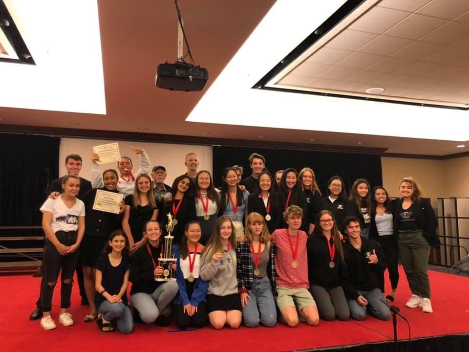 Hernandez celebrates with her high school debate team after a successful competition in Honolulu in February 2020. Hernandez said the debate team helped her discover her passion for politics.