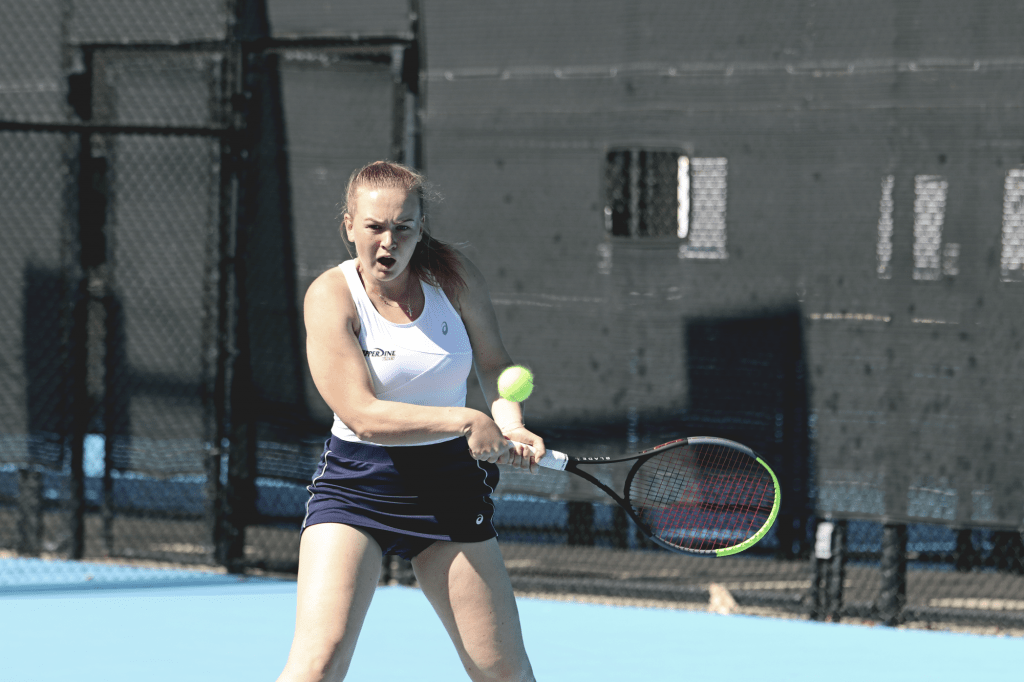 Freshman Taisiya Pachkaleva anticipates a backhand during her singles match on court four. Pachkaleva defeated Oklahoma State sophomore Dariya Detkovskaya, continuing her hot streak of four consecutive singles wins.