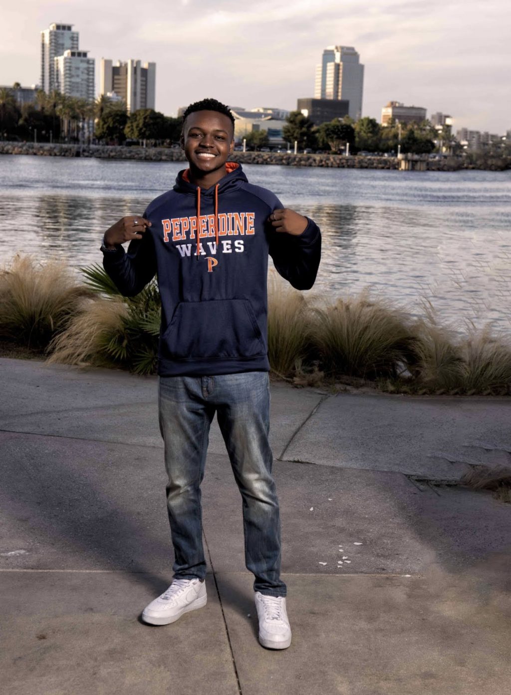 Wicks takes pictures for graduation in Long Beach, Calif., in July. He said seeing how serious Pepperdine was about community and the Christian affiliation were the two biggest contributors to his decision to rank Pepperdine as his first choice.