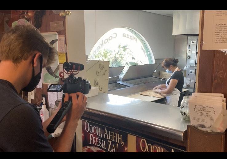 Ladas films a glimpse behind the scenes for their restaurant profile on The Pizza Cookery in August in Encino, Calif. Djalilov said the 40-year-old restaurant was the first they profiled.