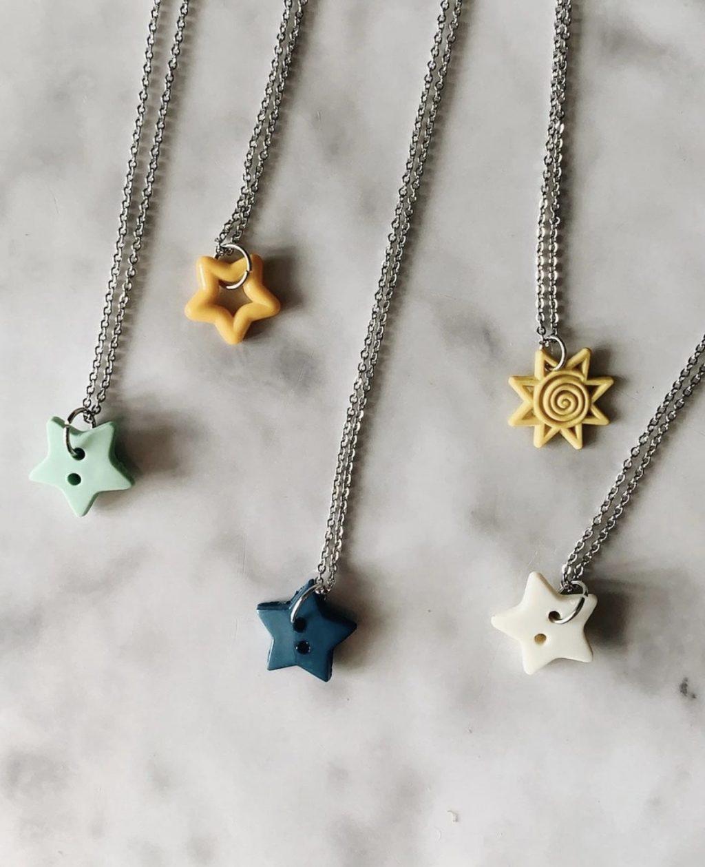 Tyler's newest necklaces include star and sun repurposed button charms, featured on her Etsy since December. Tyler said many Pepperdine students and friends have supported her business, and she is excited to watch it blossom.
