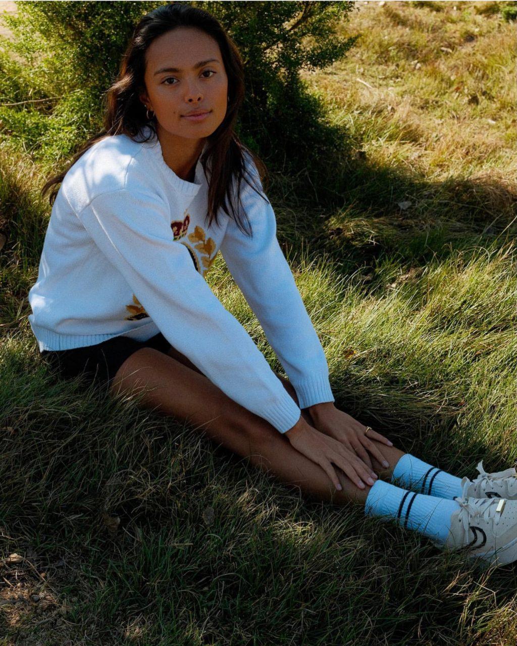 Amigleo pairs a vintage sweater with a pair of biker shorts for a stylish spring look in Malibu, Calif., in November. Amigleo said tube socks and biker shorts are two of her favorite spring fashion trends. Photo courtesy of Lauren Amigleo