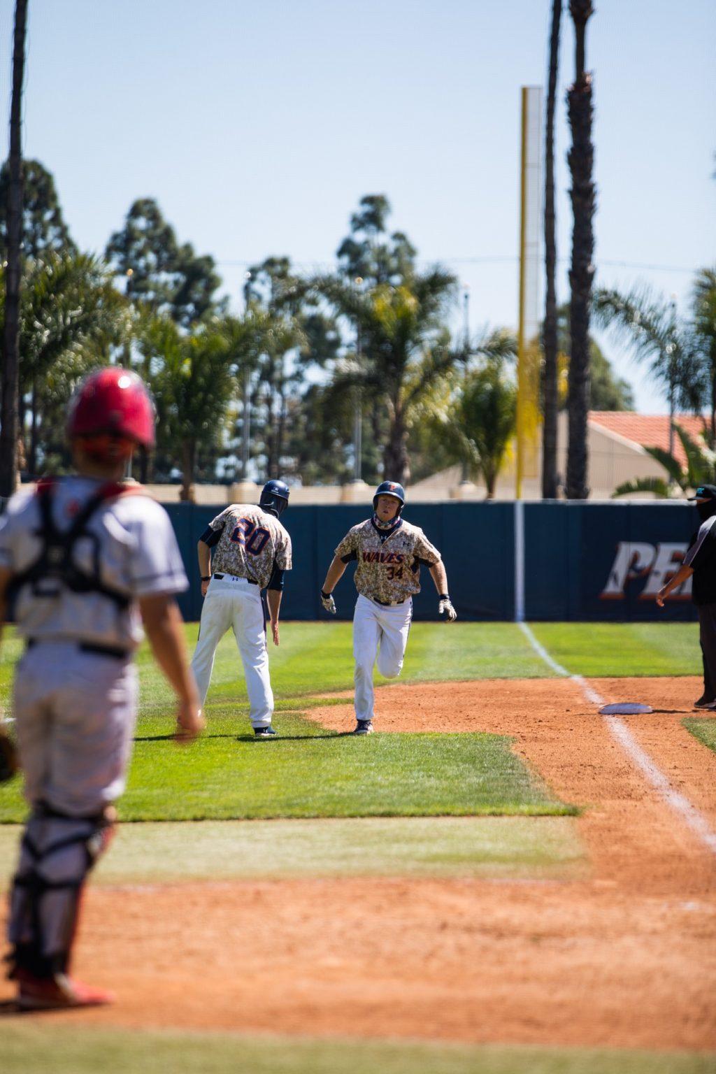 Pepperdine senior first baseman Justin Lutes rounds third after blasting a 375-foot home run to right field Saturday in Malibu. Lutes' homer put the Waves ahead 2-1 en route to a series-clinching 7-2 win.