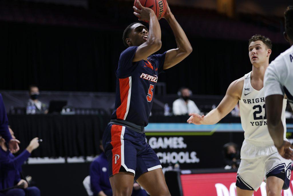 Senior guard Jadé Smith (No. 5) attempts a shot against BYU in Las Vegas. Smith's 10 second-half points were key in keeping Pepperdine in the game.