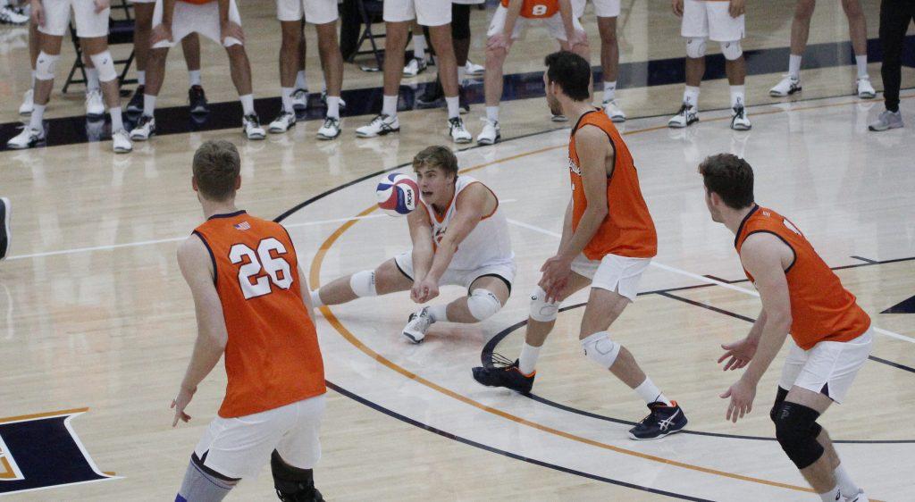 Freshman libero Trey Cole digs a ball during the second set against the BYU Cougars on Saturday at Firestone Fieldhouse. Cole earned the starting position for Saturday's match to boost the Waves' serve receive.