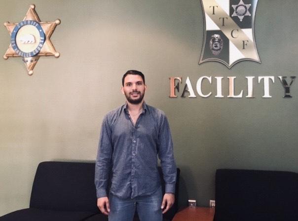 Peykar stands in the Twin Tower Correctional Facility in April 2019, in Los Angeles. The author said he played ping pong with the inmates to make human connections.