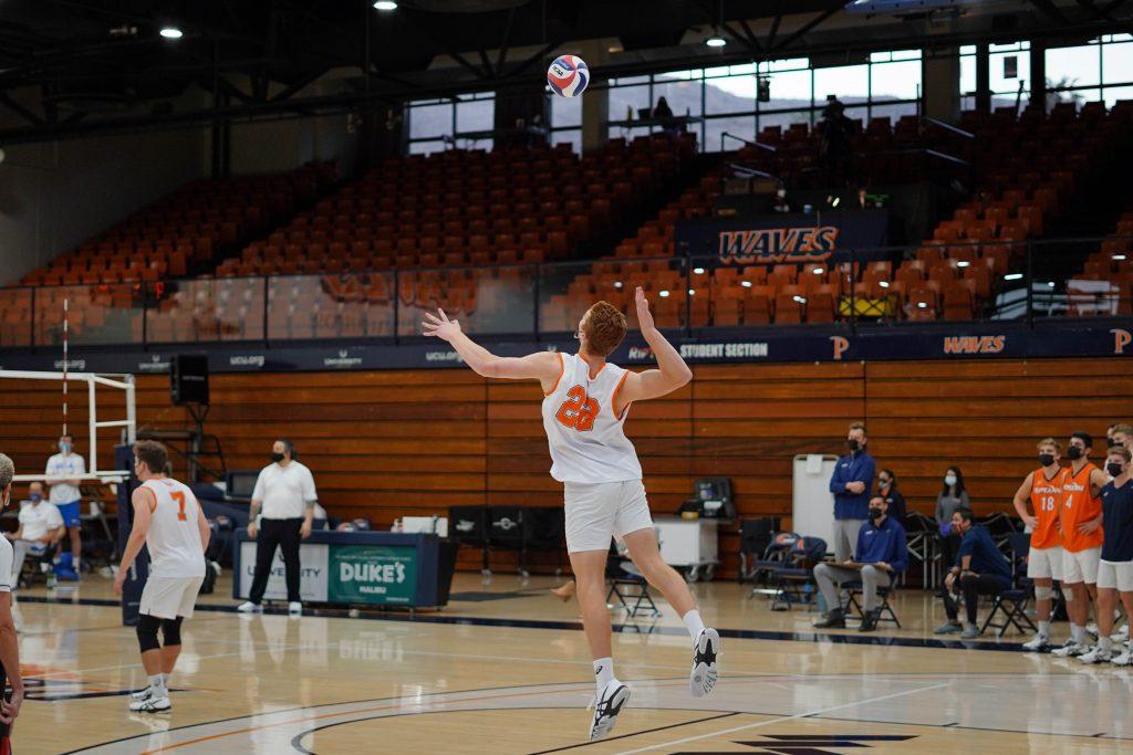 Freshman middle blocker Andersen Fuller bows back for a jump serve against the Bruins. The Waves got revenge on the Bruins after losing in five in LA by winning at home in four sets.