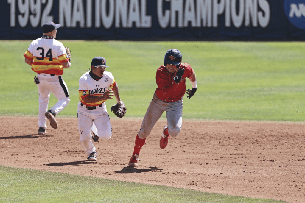 Pepperdine junior shortstop Wyatt Young pursues a Saint Mary's player in a rundown during Sunday's game at Eddy D. Field Stadium. The Waves defense committed only one error over the weekend series, but dropped Sunday's game 3-2.