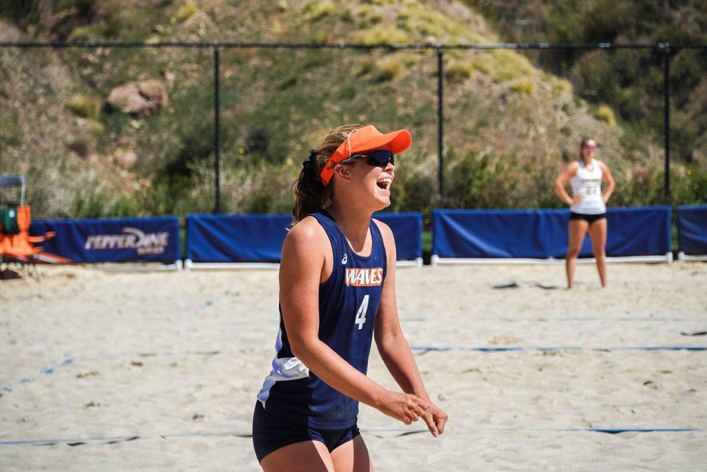 Sophomore Mary Sinclair celebrates after a scored point versus USC. Sinclair and her partner Wright defeated the Concordia Eagles in three sets and lost to the Trojans.