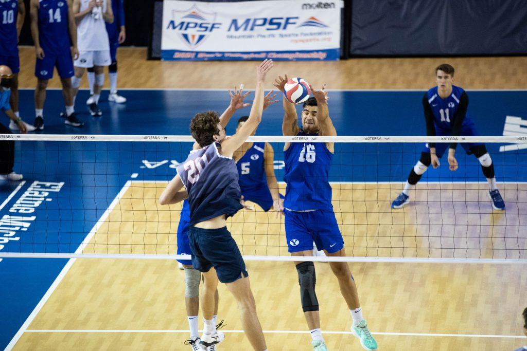 Pepperdine redshirt senior middle blocker Austin Wilmot swings against a block attempt from BYU senior middle blocker Felipe De Brito Ferreira in the championship match of the MPSF tournament April 24. The MPSF named Wilmot to its all-conference second team prior to the tournament.
