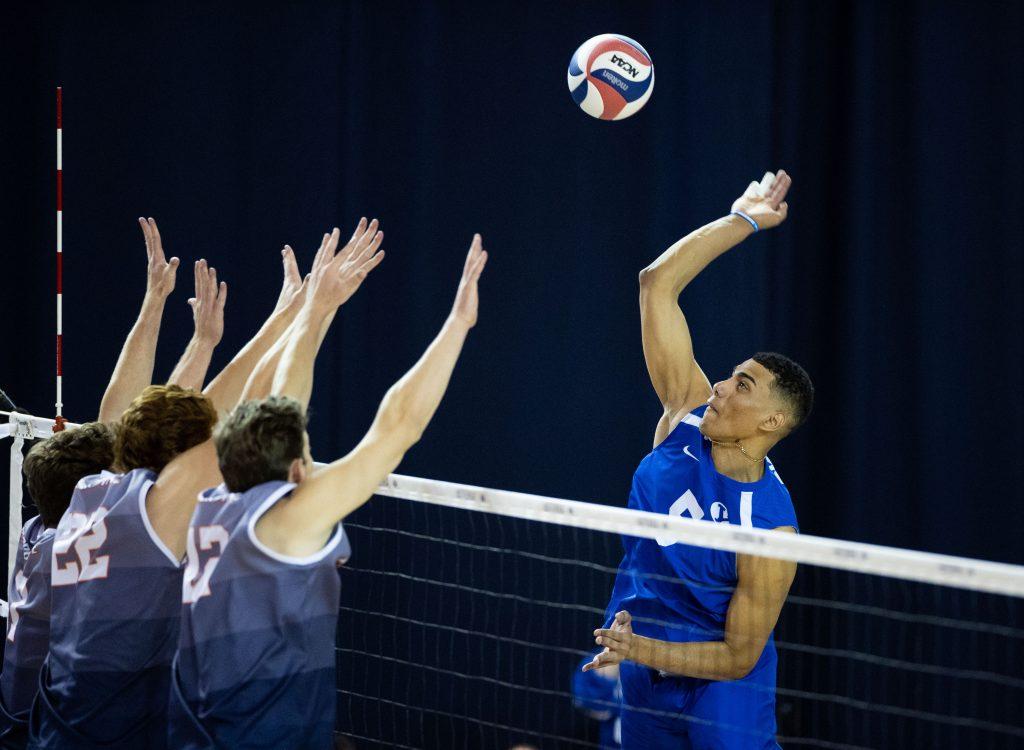 BYU junior opposite Gabi Garcia Fernandez unleashes a swing against a Pepperdine triple block of Spencer Wickens, Andersen Fuller and Jacob Steele on April 24, at BYU. Garcia Fernandez finished with 10 kills in the match, while the Waves registered one block.