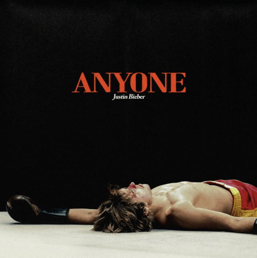 The cover artwork for Bieber&squot;s single, "Anyone," from his new album, "Justice," features Bieber laying down exhausted after a boxing match. In the song, Bieber asserted his love for his wife, Hailey Baldwin Bieber, who he married in 2018.