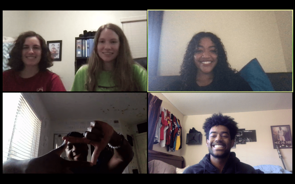 Compassion in Action members and the Board, (clockwise from top left) first-year Rowan Yeager, junior Isabella Yeager, junior Lillian Annan, Bennett Annan and junior King Uchekwe smile during their learning circle in April. Yeager said she was inspired to start the club that focuses on developing mindfulness and compassion through meditation and community service.