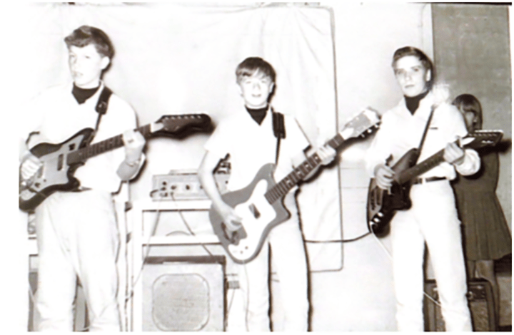 Taylor Mathews' grandpa, Howard Taylor (far right), plays the electric guitar with his band in 1966. Taylor was in eighth grade at the time, and his band eventually named themselves The Shades of Dawn.
