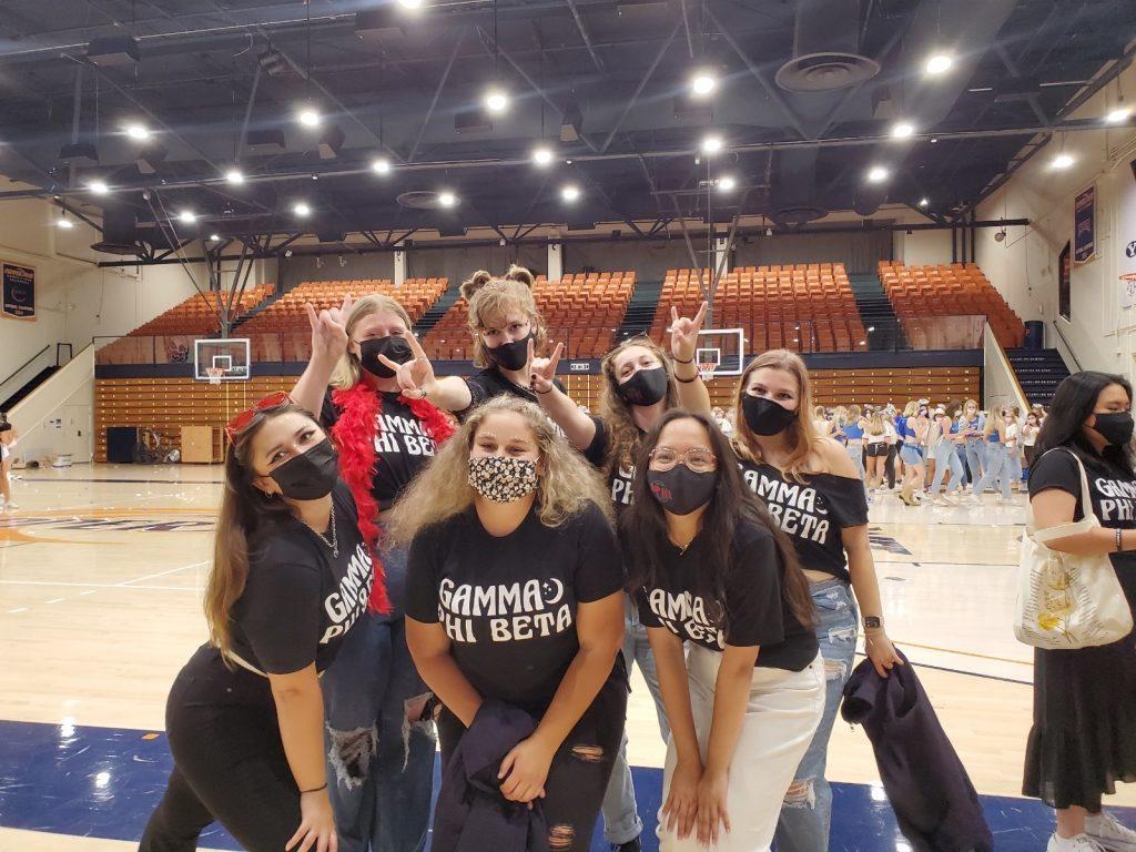 Gamma Phi Beta Rho Gammas gather to reveal their identities to new members. During recruitment, Rho Gammas disaffiliate from their sororities to be unbiased people for PNMs to go to until they all reunite with their chapters on bid night. Photo courtesy of Ava Avolio