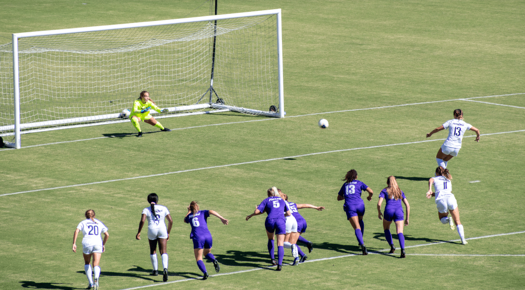 Trinity Watson (No. 13) takes a penalty kick against University of Portland on Saturday, Oct. 2. The Waves won by a score of 3-0, and improved to 10-1-0 on the season.