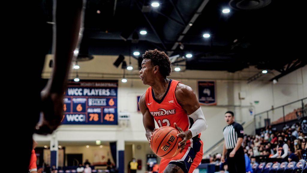 Sophomore forward Kendall Munson looks for an open teammate. Romar said Munson was a catalyst in the second half as he contributed with three steals.