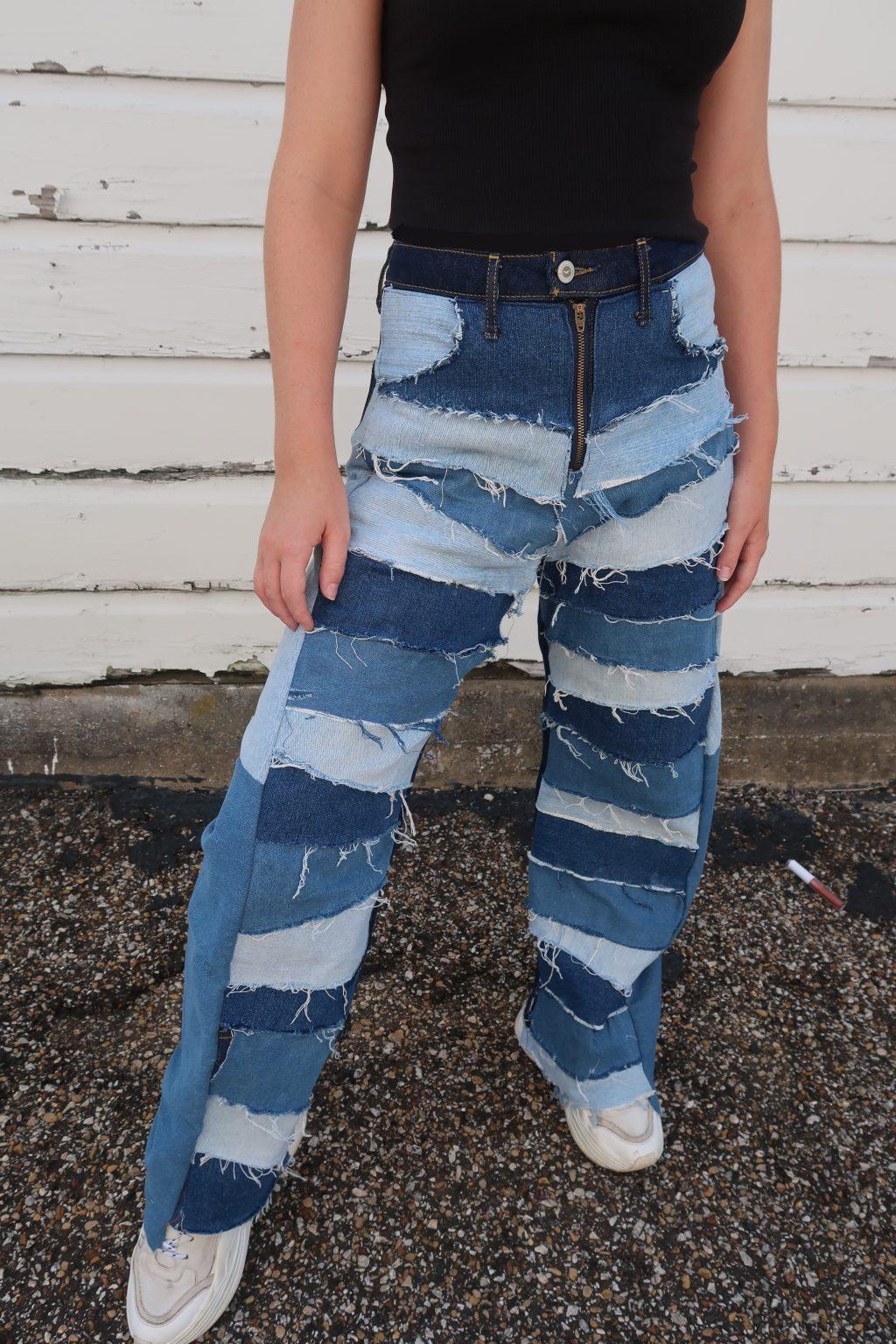 Mentzer upcycles clothes she finds at thrift stores, such as these jeans from fall 2020 in Dallas. She cut, stitched and sewed her way to creating a piece with many layers of different denim. Photo courtesy of Myers Mentzer