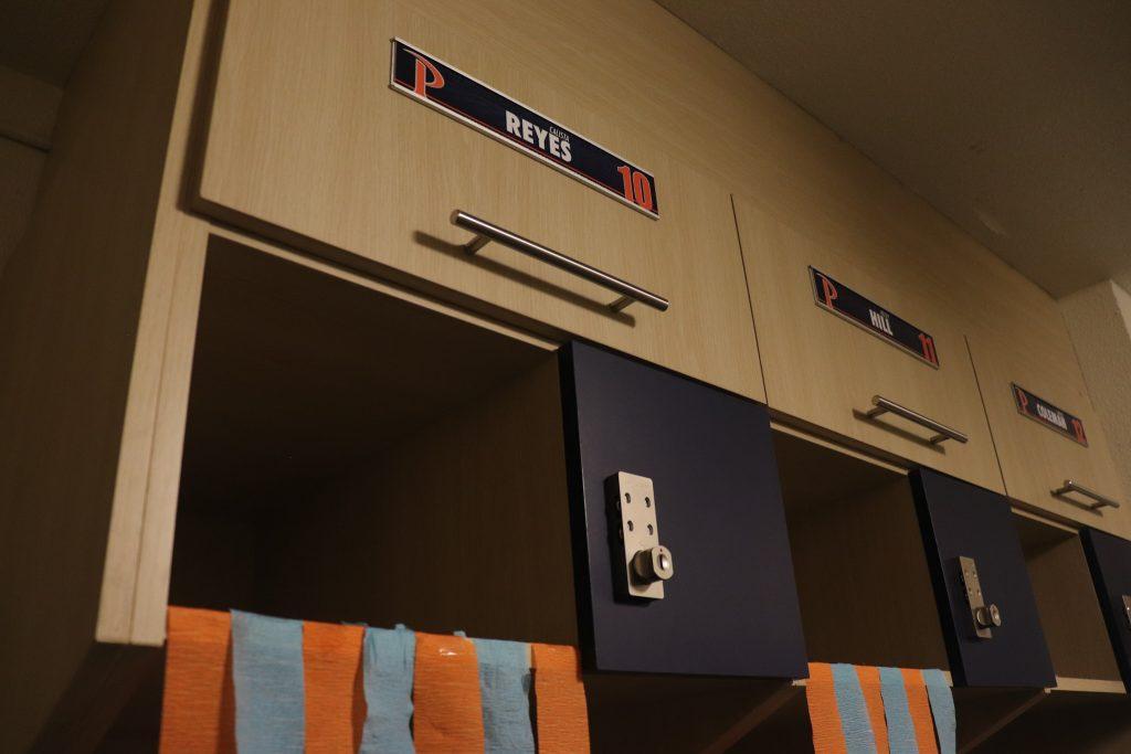 Redshirt senior forward Calista Reyes and teammates each have their own locker space. They are closing conference play this week before entering into postseason. Photo by Denver Patterson