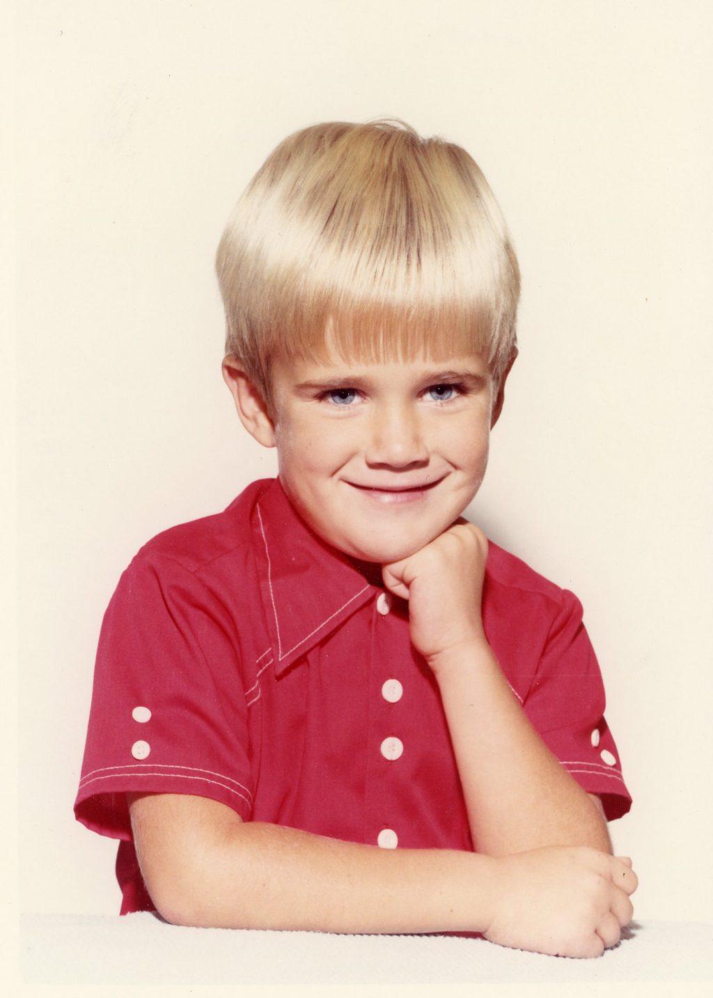 Young Gash strikes a pose for the camera during his school photos. Gash said his parents considered him a good kid with a big personality. Photo courtesy of Jim Gash