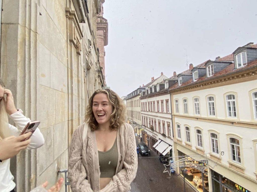 Sophomore Maeve Mueller looks at the view of Heidelberg from a balcony outside the classrooms Jan. 7. Mueller said she always dreamed of studying abroad in Germany and it felt surreal to finally arrive. Photo courtesy of Maeve Mueller