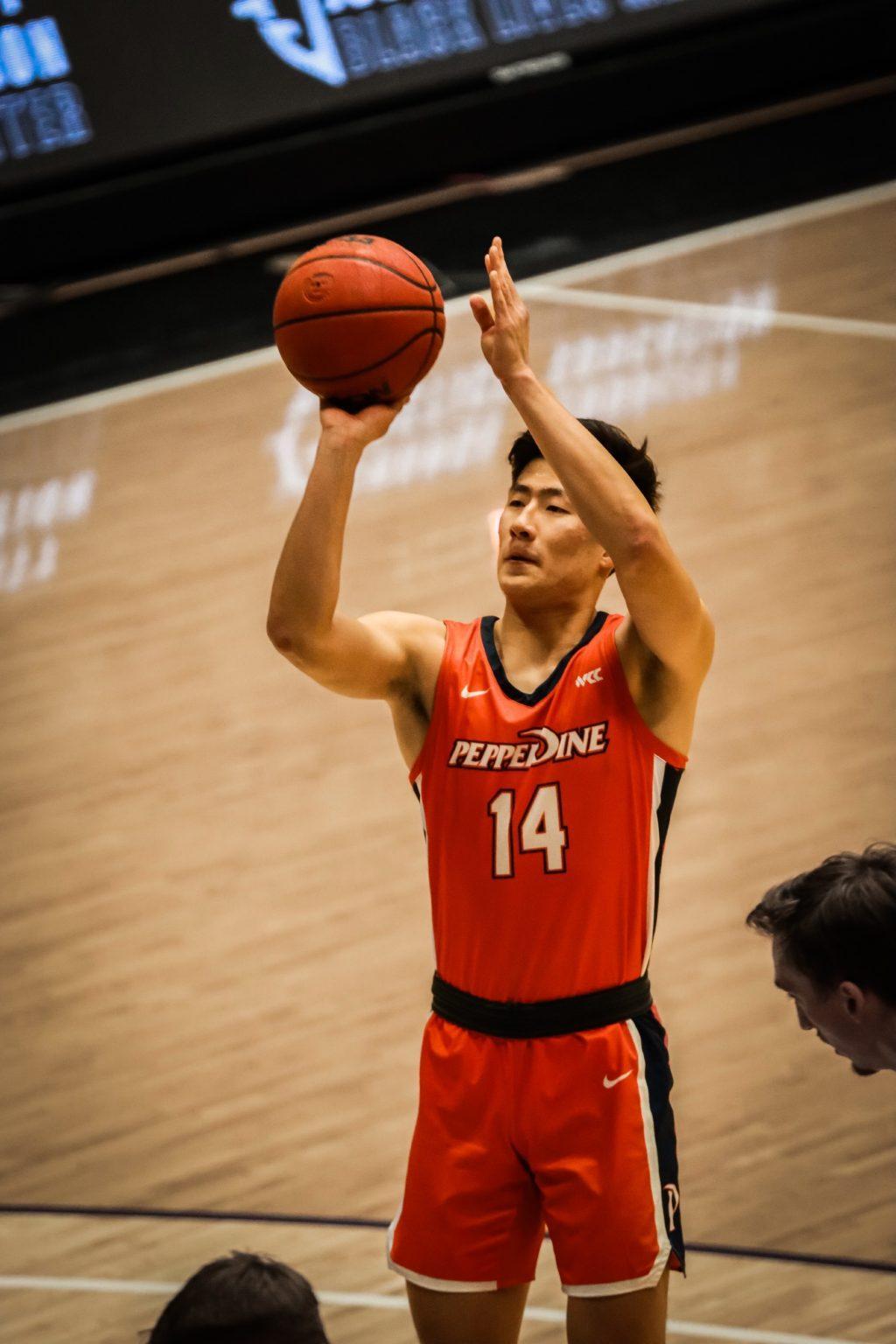Yoon attempts a free throw during a game. Yoon got his first career start versus Portland on Feb. 19, when he scored seven points on 2-5 shooting.
