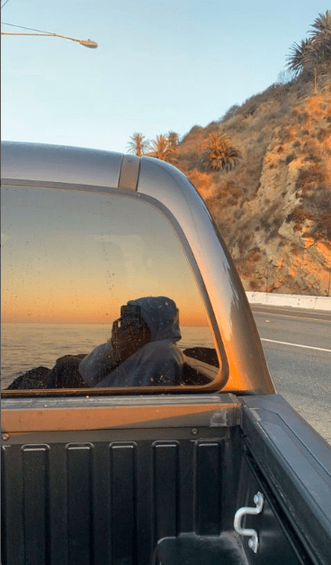 Looking at her reflection in the car window, first-year Catie Caine takes a picture. Her creativity sparked and caused her to capture this aesthetically pleasing moment. Photo courtesy of Catie Caine