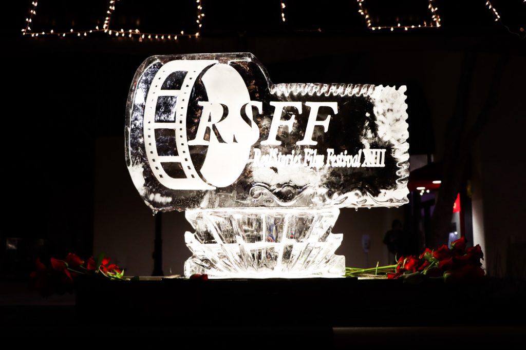 An ice sculpture made for ReelStories sits in a tent set up for the festival. This year was the first year that ReelStories was able to happen on campus since 2020.