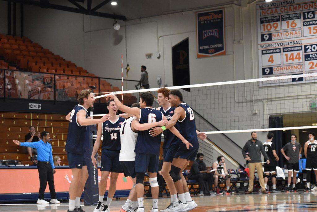 The Waves gather after   . Pepperdine's last three wins have all been 3-0 sweeps. Photo by Mary Elisabeth