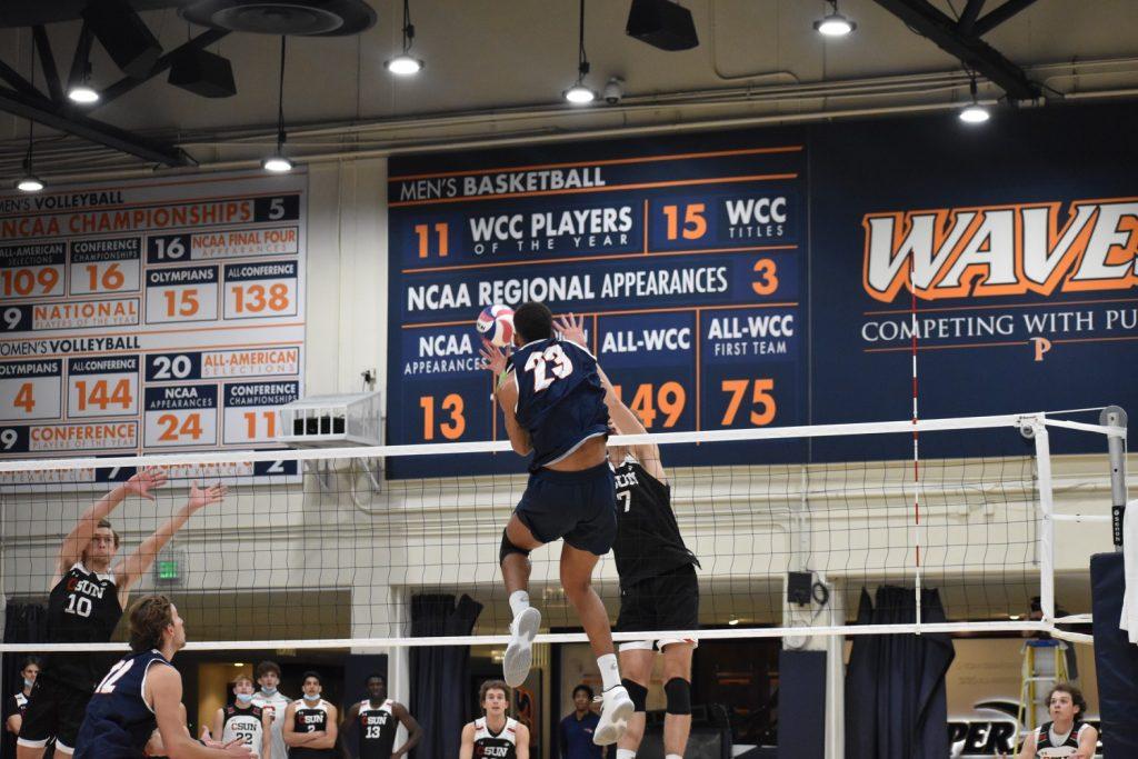 Graduate student outside hitter Jaylen Jasper tools the Northridge block in the . Jasper leads the team with 199 kills in the season. Photo by Mary Elisabeth