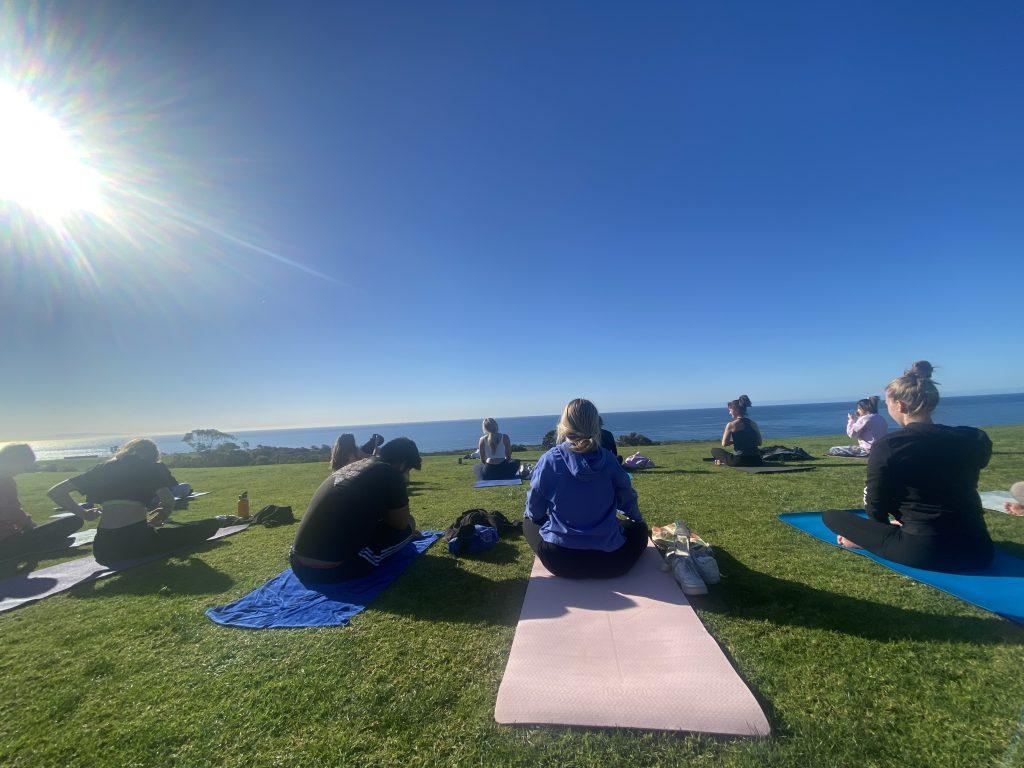 Students in the Seaver 200 yoga breakout group listen closely to their instructor as she walks them through various moves. Lucey really enjoyed her time in the group because it gave her time to calm her mind and body weekly. Photo courtesy of Jadyn Lucey